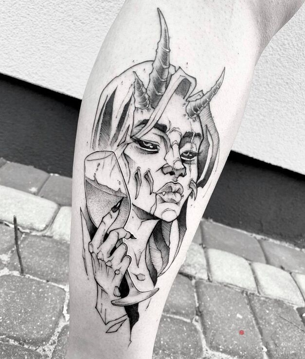 Tattoo Kobieta in black and gray motif and graphic / illustrative style on the calf