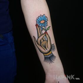 Tattoo Old school On the arm motif: flowers style: oldschool