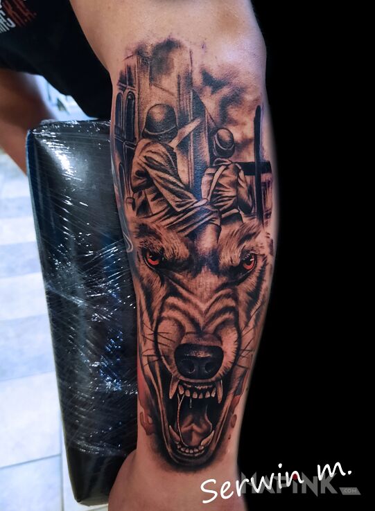 Tattoo Patriotyczny in characters motif and realistic style On the arm