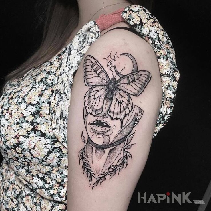 Tattoo On my mind in black and gray motif and graphic / illustrative style on the upper arm