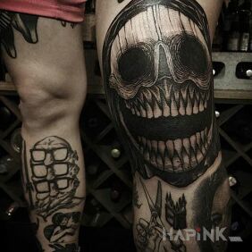 Tattoo Japa on the tibia motif: black and gray style: graphic / illustrative