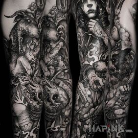 Tattoo She-devil with hellish beasts on the bicep motif: dark style: graphic / illustrative