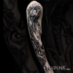 Tattoo Noonwraith on the upper arm motif: sleeves style: graphic / illustrative