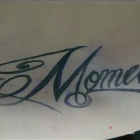 Tattoo Piwrwrst tatoo on the upper arm motif: lettering