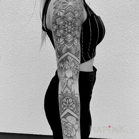 Tattoo Sleeve on the forearm motif: black and gray style: geometric
