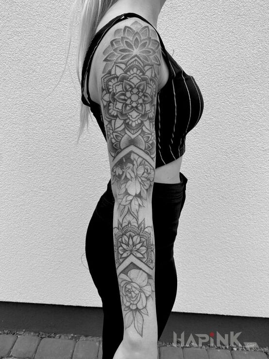 Tattoo Rękaw in flowers motif and geometric style On the arm