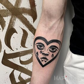 Tattoo Old school on the forearm motif: black and gray style: graphic / illustrative