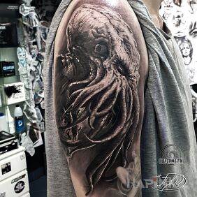 Tattoo Cthulhu - The Great Old One On the arm motif: dark style: realistic