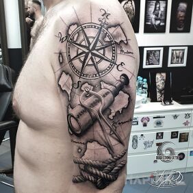 Tattoo Travel theme :D on the upper arm motif: objects style: realistic