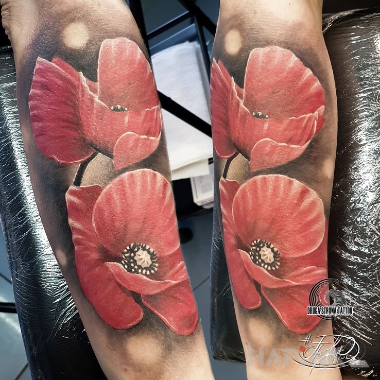 Tattoo Maki, maczki dwa :D in flowers motif and realistic style On the arm