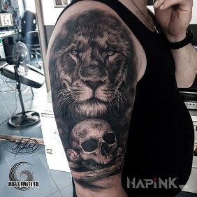 Tattoo When you meet a lion, your fate is sealed... On the arm motif: black and gray style: realistic