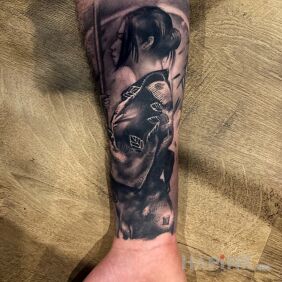 Tattoo Japanese warrior woman on the forearm motif: characters style: realistic