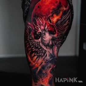 Tattoo Phoenix on a red background on the thigh motif: fantasy style: realistic