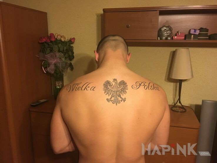 Tattoo POLSKA in lettering motif on the back