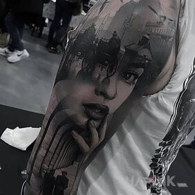 Tattoo Memories from the old times on the upper arm motif: faces style: realistic