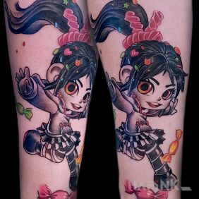 Tattoo Ralf Demolka on the forearm motif: colorful style: cartoon / comic book