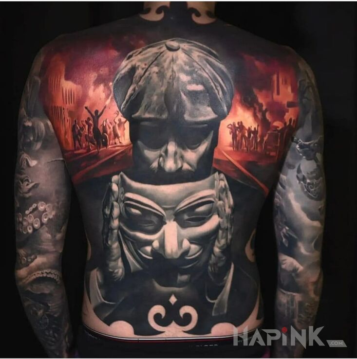Tattoo Rewolucja jest blisko in faces motif and realistic style on the forearm