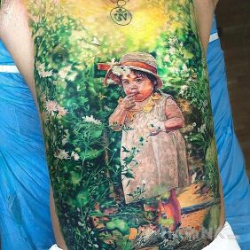 Tattoo Girl in the garden on the stomach motif: colorful style: realistic