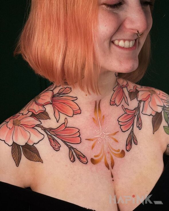 Tattoo Barki w kwiatach in colorful motif and neo-traditional style on the shoulder