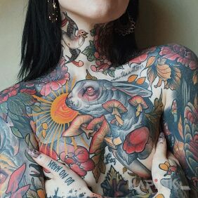 Tattoo Rabbit behind the mushrooms on the neck motif: floral style: newschool