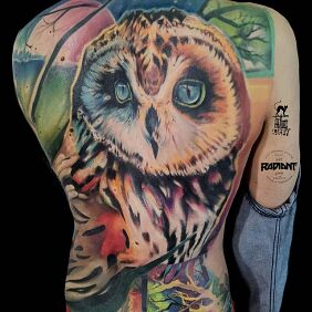 Tattoo Owl female composition on the shoulder blades motif: animals style: abstract