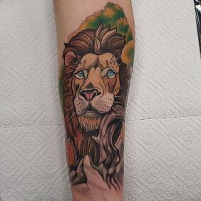 Tattoo Lion On the arm motif: zodiac signs style: neo-traditional