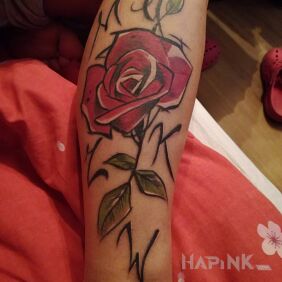 Tattoo Rose with initials on the calf motif: flowers