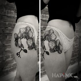 Tattoo Orchid on the leg motif: flowers