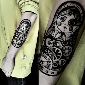 Tattoo Matryoshka On the arm motif: objects style: blackwork / blackout
