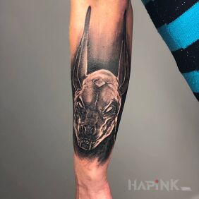Tattoo Anubis On the arm motif: demons style: realistic