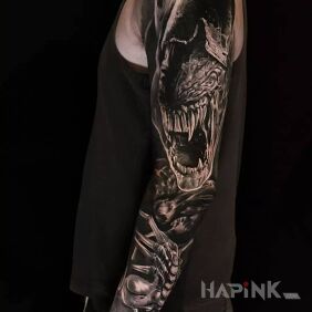 Tattoo Alien attacks On the arm motif: characters style: realistic