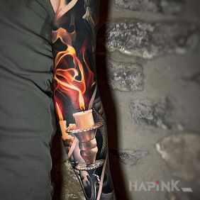 Tattoo Burning candle On the arm motif: colorful style: realistic