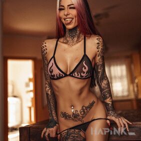 Tattoo Witch's appearance on the stomach motif: lettering style: realistic