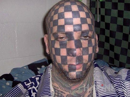 Tattoo Idiota in other motif on the face