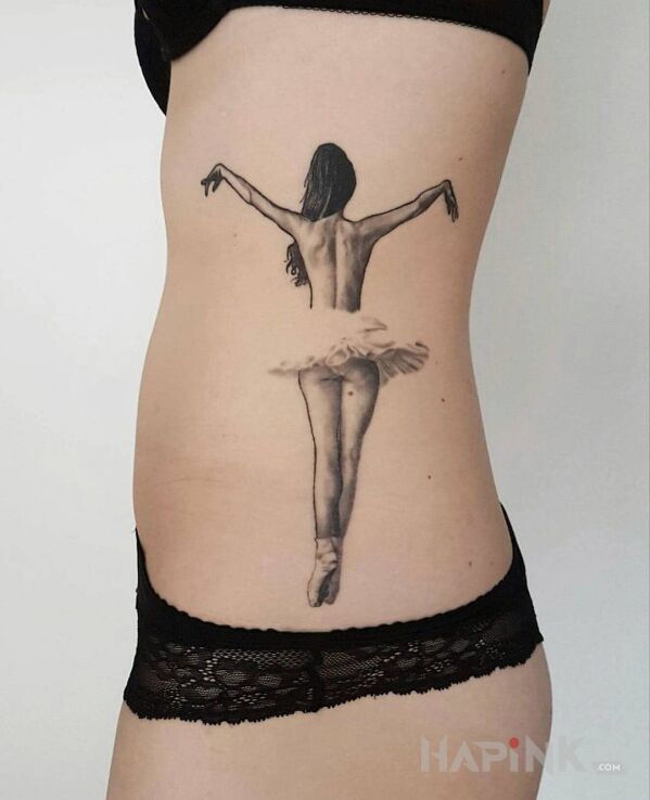 Tattoo Balerina in characters motif and realistic style on the ribs