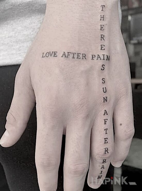 Tattoo Love afer pain in lettering motif on the fingers