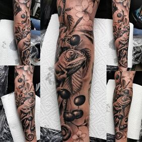 Tattoo Chameleon On the arm motif: flowers style: realistic