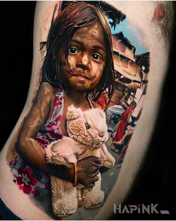 Tattoo Dziewczynka ze slumsów in faces motif and realistic style on the ribs