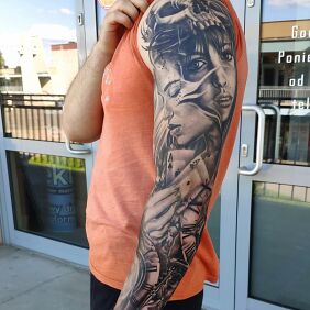 Tattoo Clock with cards on the forearm motif: sleeves style: realistic
