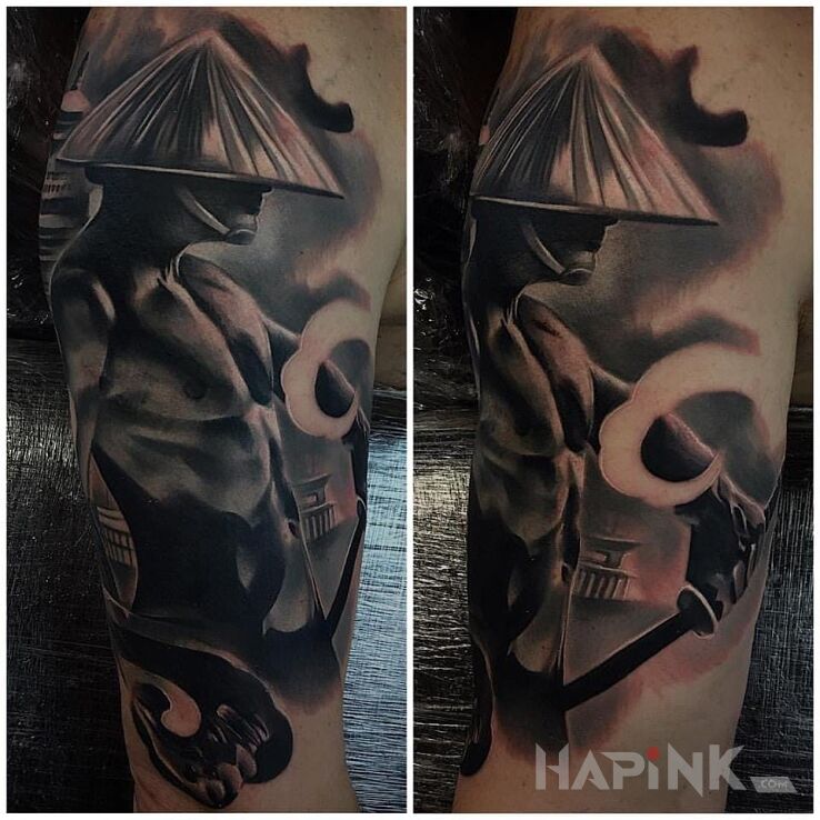 Tattoo Japoński wojownik in characters motif and japanese / irezumi style on the upper arm