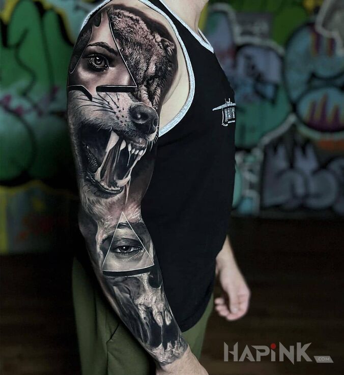 Tattoo Oczy w trójkątach in black and gray motif and realistic style On the arm