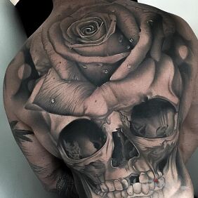 Tattoo Big Czacha on the back motif: skulls style: realistic