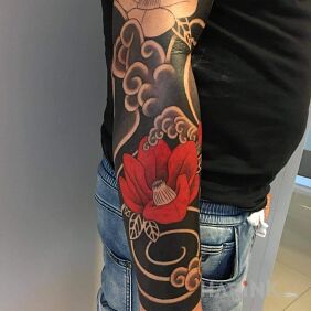 Tattoo Hot black & red On the arm motif: sleeves style: japanese / irezumi