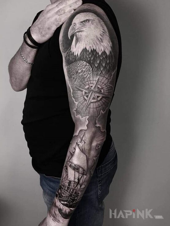 Tattoo Wolność, pasja, przygoda in black and gray motif and realistic style on the forearm