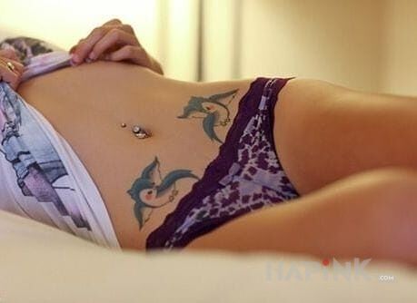 Tattoo Dwa ptaszki in animals motif on the stomach