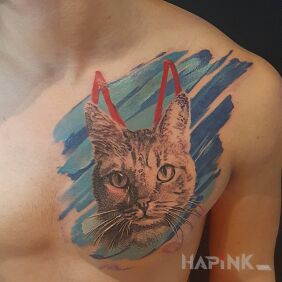 Tattoo Cat with devil horns on the chest motif: colorful style: realistic