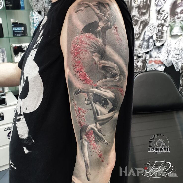 Tattoo Taneczne inspiracje :D in black and gray motif and realistic style On the arm