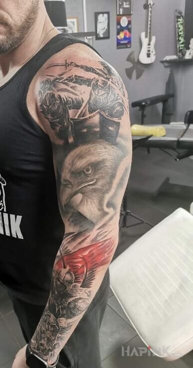 Tattoo Polska w natarciu in sleeves motif and realistic style on the forearm