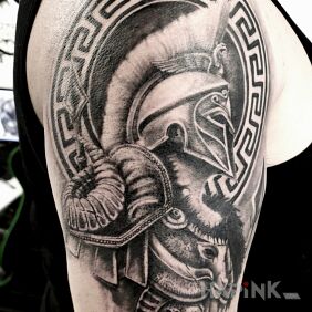 Tattoo Gladiator on the upper arm motif: black and gray style: graphic / illustrative