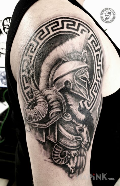 Tattoo Gladiator in characters motif and graphic / illustrative style on the upper arm